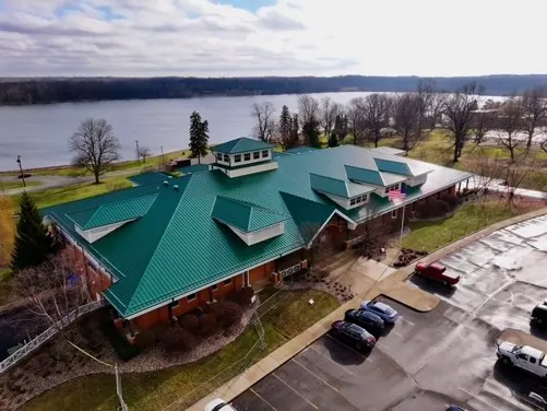 Tarping and dry-in on a Sweetser commercial roof